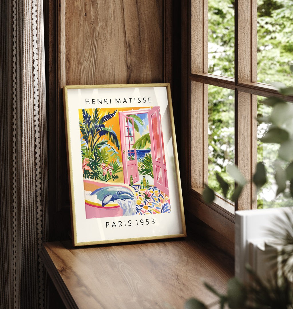 Matisse-style framed wall art featuring a whimsical whale in a tub with vibrant foliage and blue sea in the background.