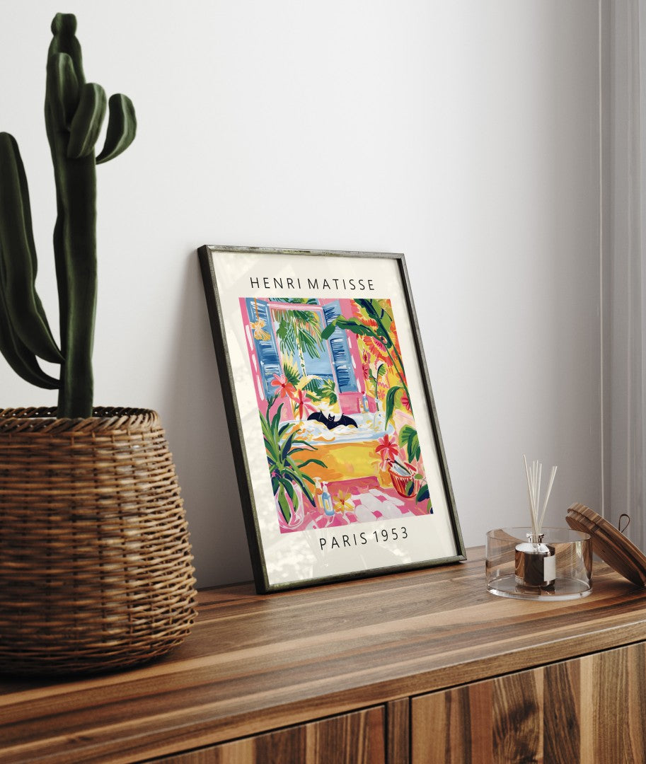 Framed Henri Matisse inspired art print of a bat floating in a yellow bathtub with tropical plants - bathroom wall art print for decor