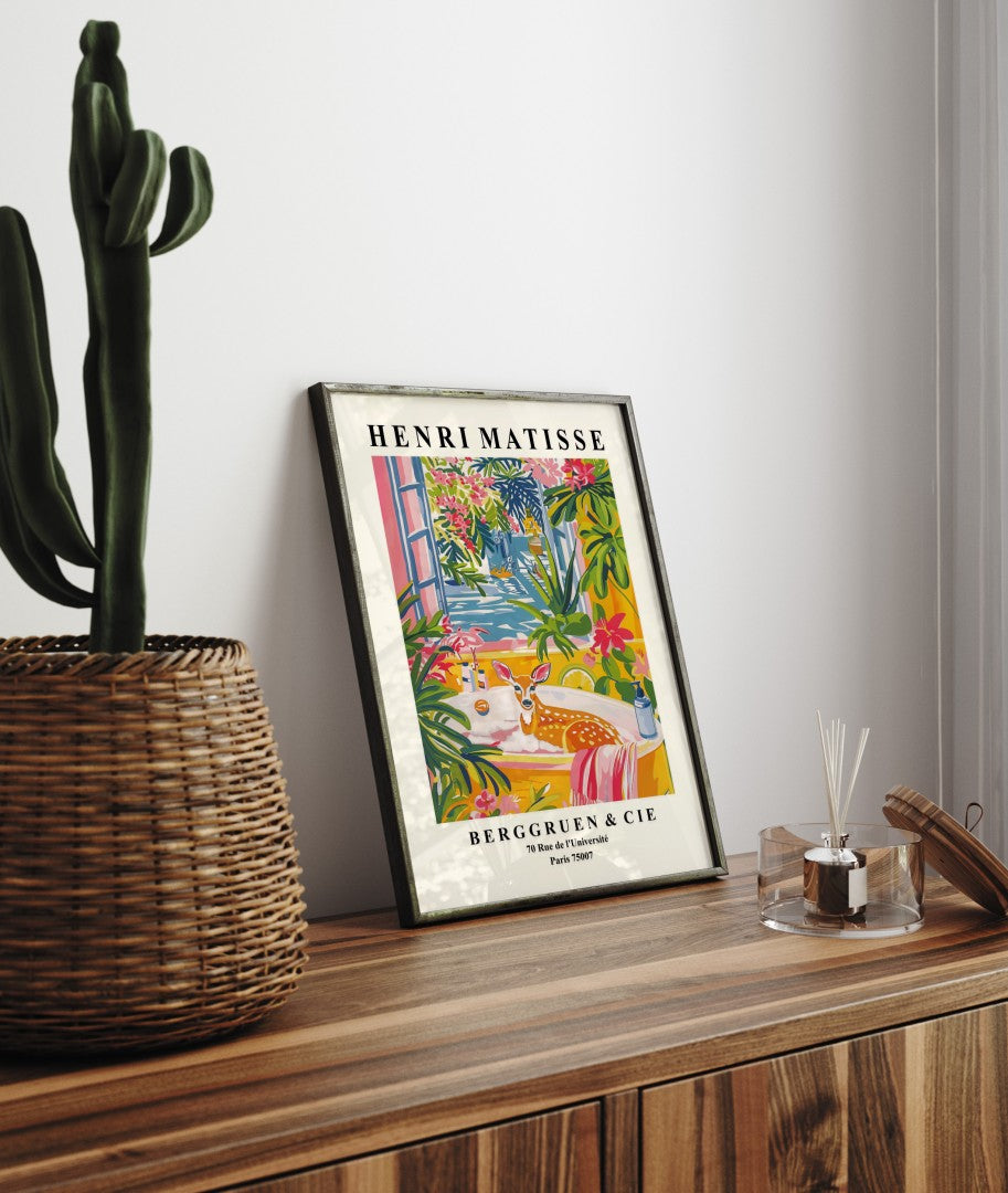 Framed Henri Matisse inspired art print of a doe lounging in a bathtub with tropical greenery - bathroom wall art print for decor