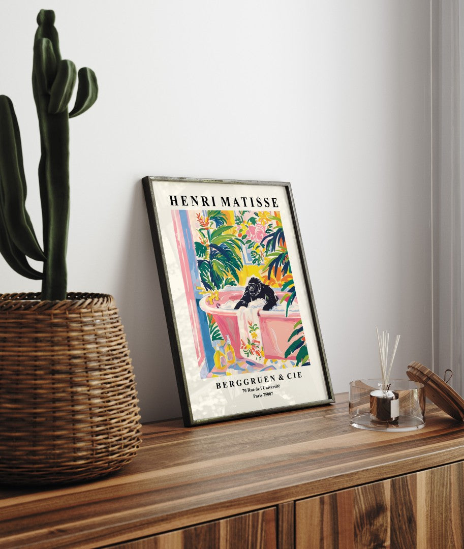 Framed Henri Matisse inspired art print of a gorilla relaxing in a tub with tropical leaves - bathroom wall art print for decor
