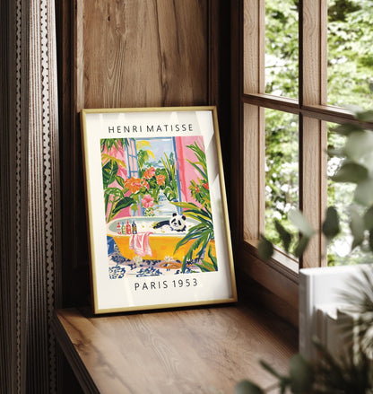 Framed Henri Matisse inspired bathroom wall art featuring a panda in a vibrant tub.