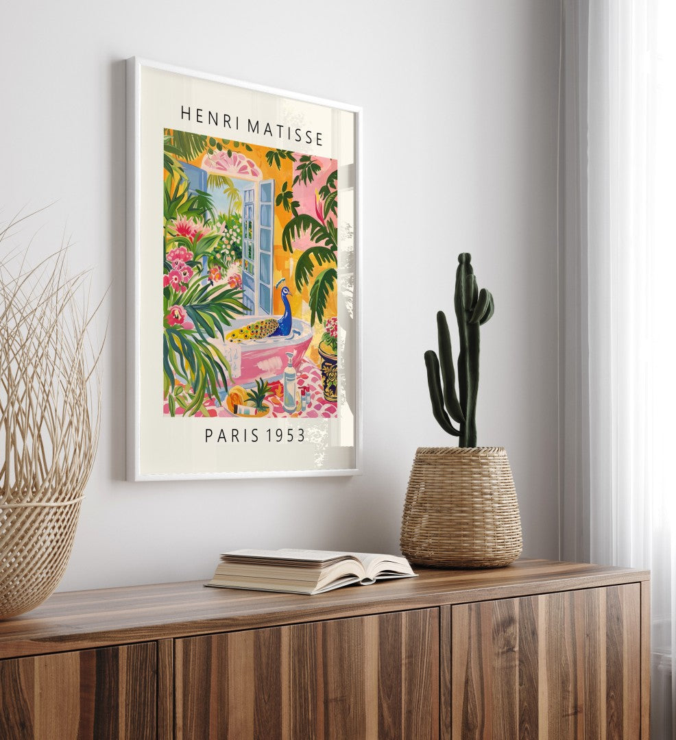 Framed tropical bathroom wall art of a majestic peacock in a pink bathtub, inspired by Matisse’s bold style.