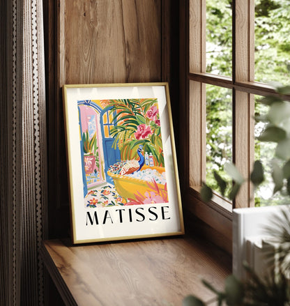 Framed Matisse inspired print featuring a colorful peacock bathing in a yellow tub amidst vibrant tropical greenery.