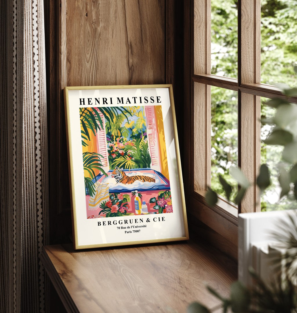 Framed art print showing tiger in bathtub with tropical plants and flowers