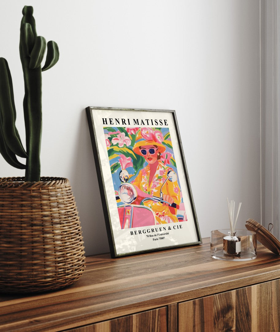 Modern Matisse style wall art of a woman on a Vespa surrounded by bold florals
