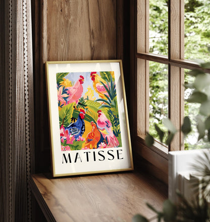 Framed wall art of vibrant roosters with floral greenery.