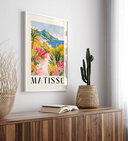Colorful framed art print of Mediterranean coastline with mountains and ocean