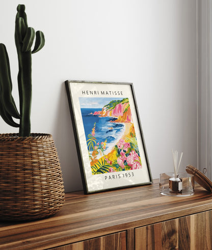 Seaside wall art framed print with bold colors, flowers, and coastline