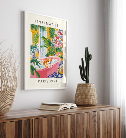 Framed Matisse style tropical bathroom print with corgi and floral accents.