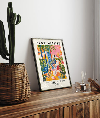 Whimsical peacock artwork with floral details in a Matisse color palette.