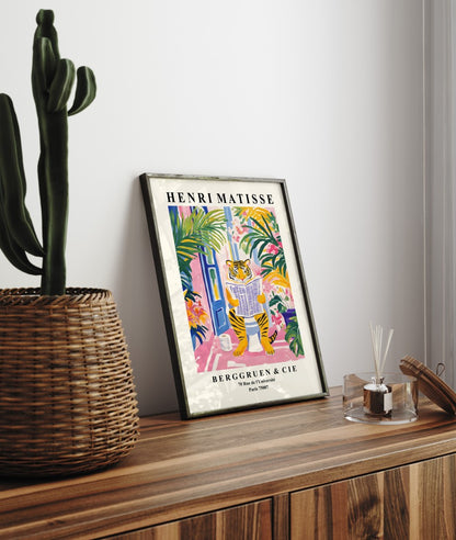 Framed tiger wall art for bathroom with bold greenery and vibrant colors.