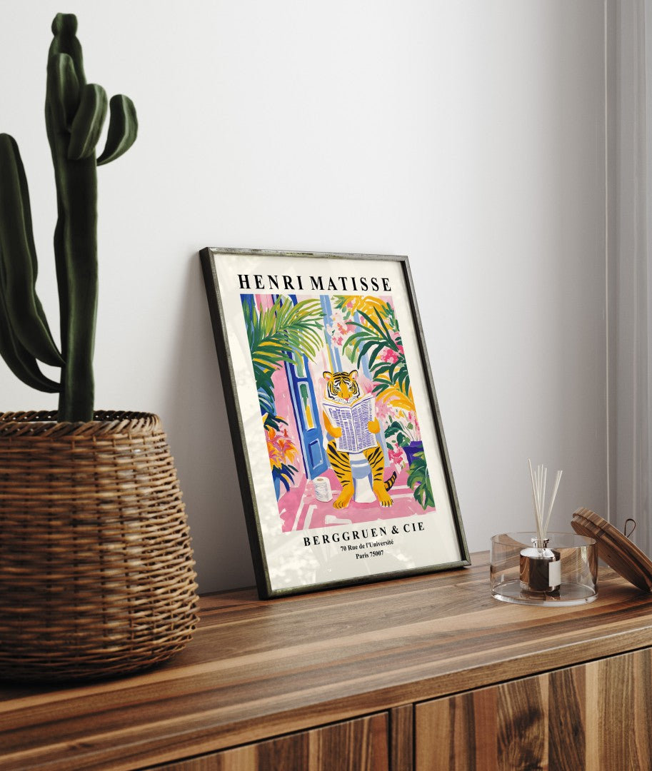 Framed tiger wall art for bathroom with bold greenery and vibrant colors.