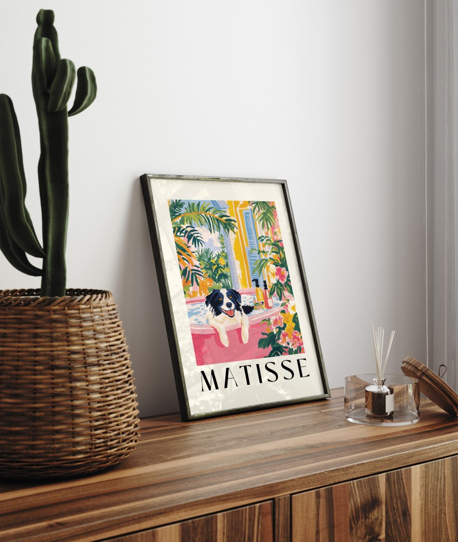 Bright and whimsical framed print of a Border Collie soaking in a pink tub.