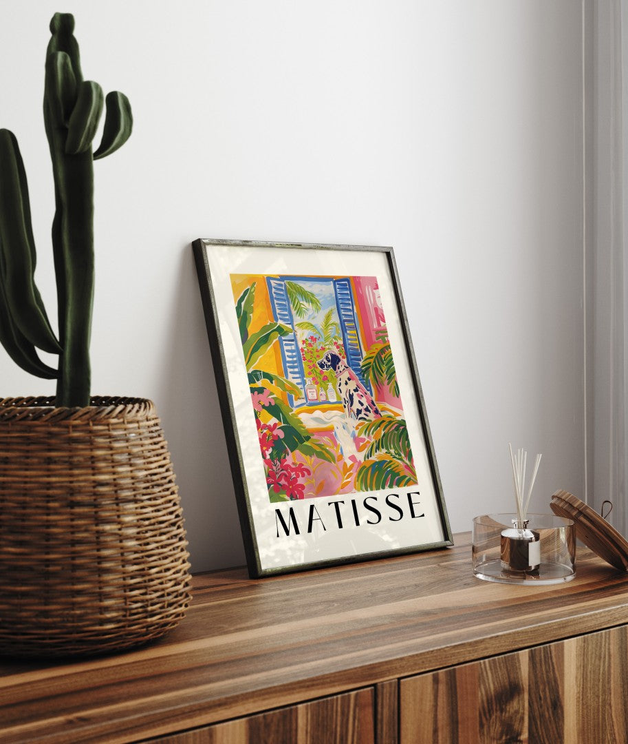 Framed artwork of a Great Dane in a bright, plant-filled interior.