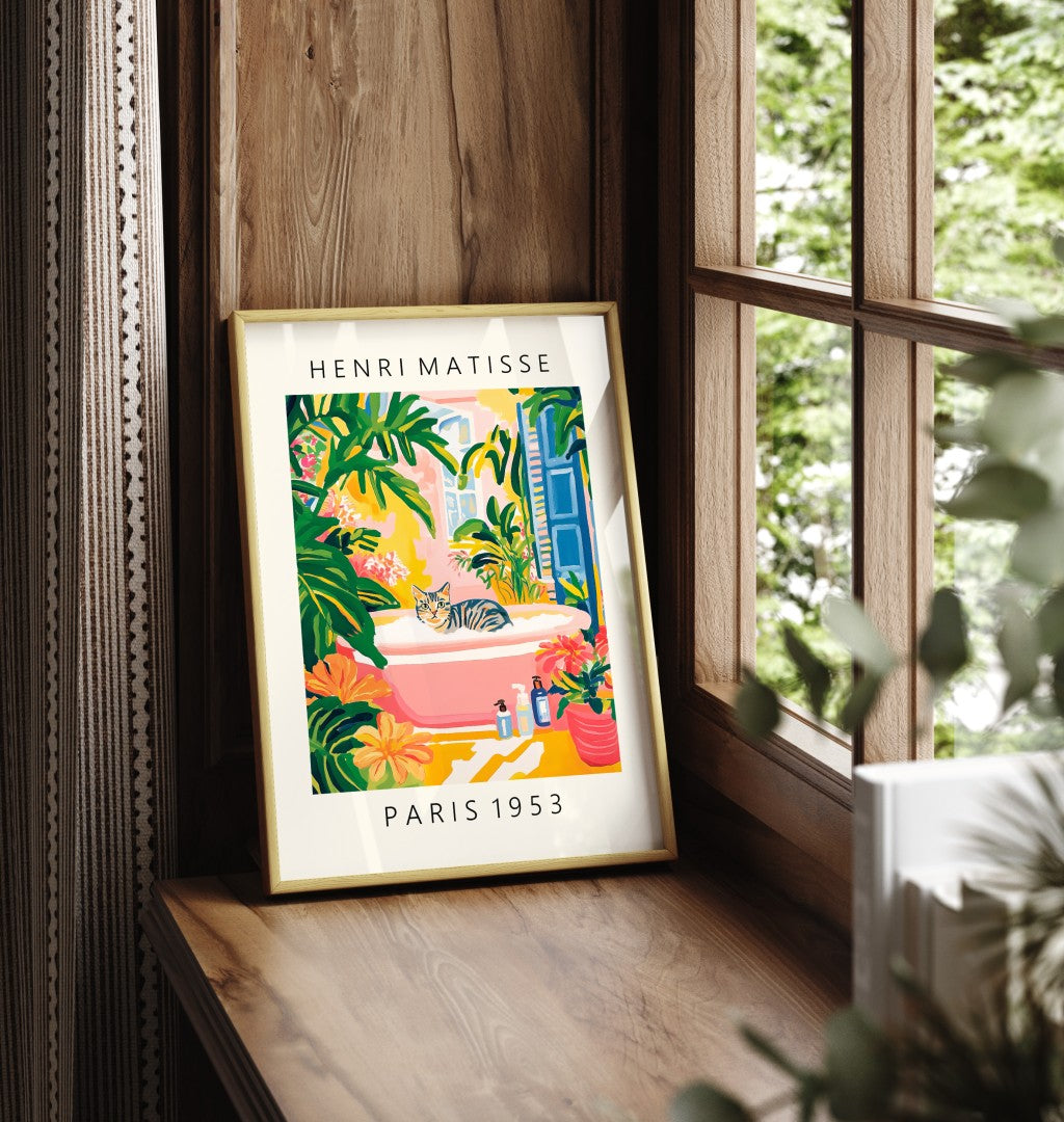 Framed tabby cat artwork with colorful flowers and greenery.