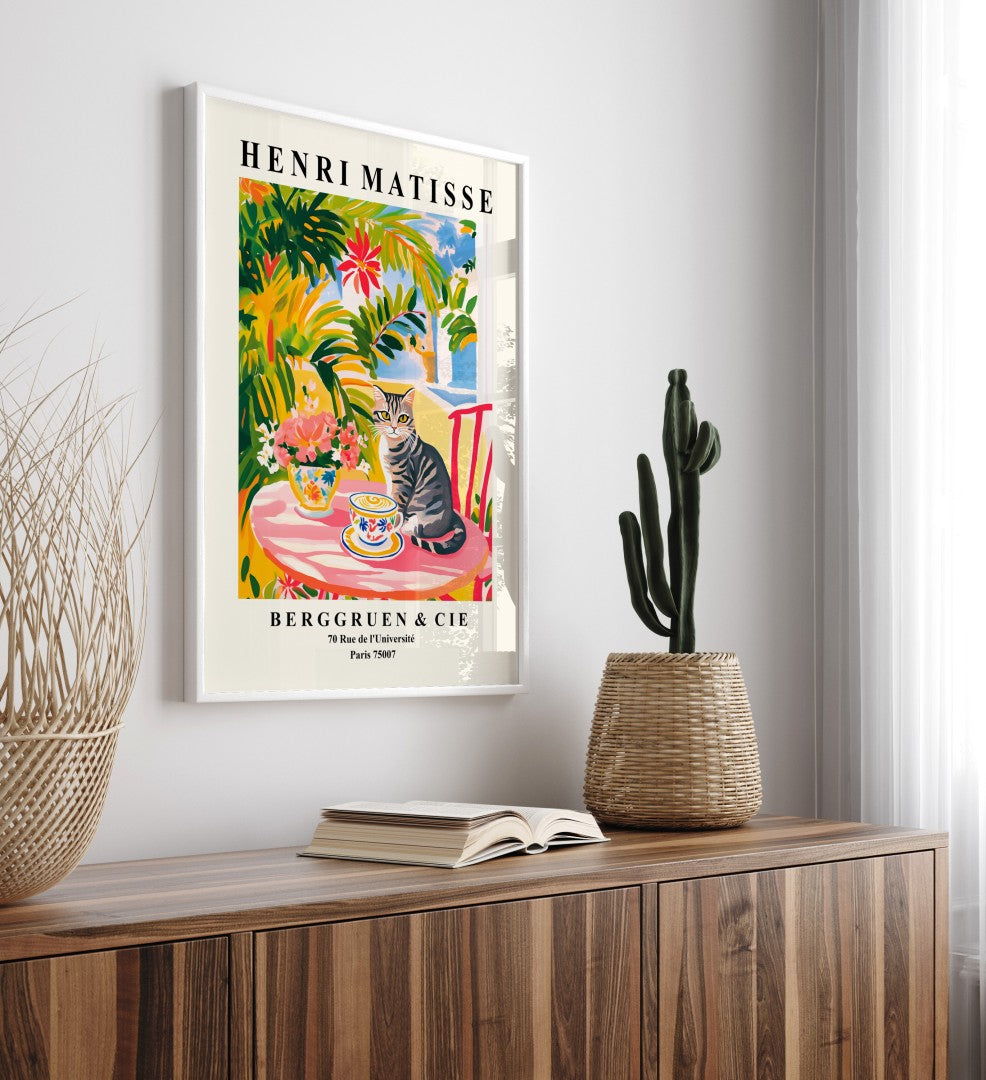 Whimsical framed art print of tabby cat at café table with bold colors