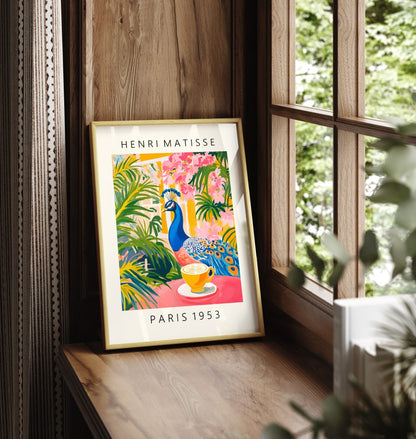 Framed peacock art print with coffee cup and tropical foliage in Matisse style