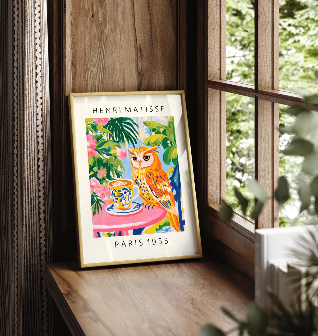 Framed owl art print with coffee cup and tropical foliage in Matisse style