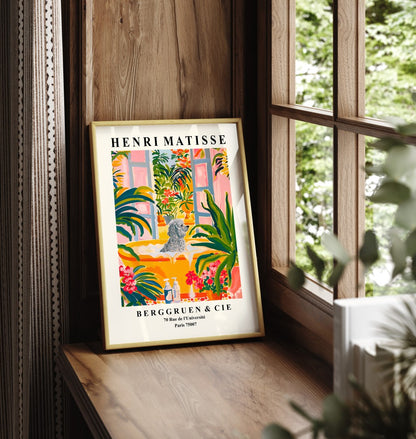 Framed poodle wall art in a Matisse-inspired bathroom setting.