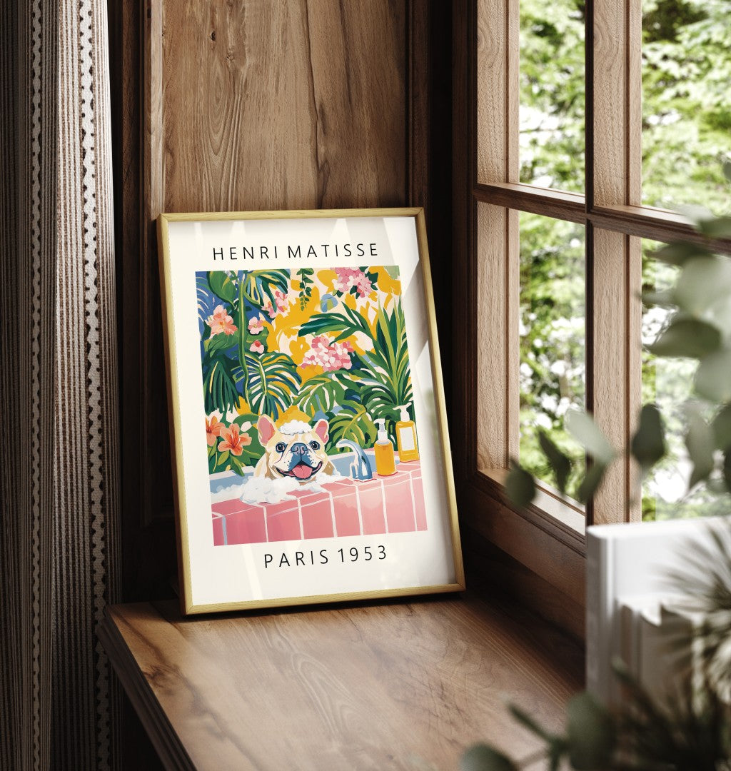 Framed wall art of a French Bulldog relaxing in a Matisse-inspired bathroom.