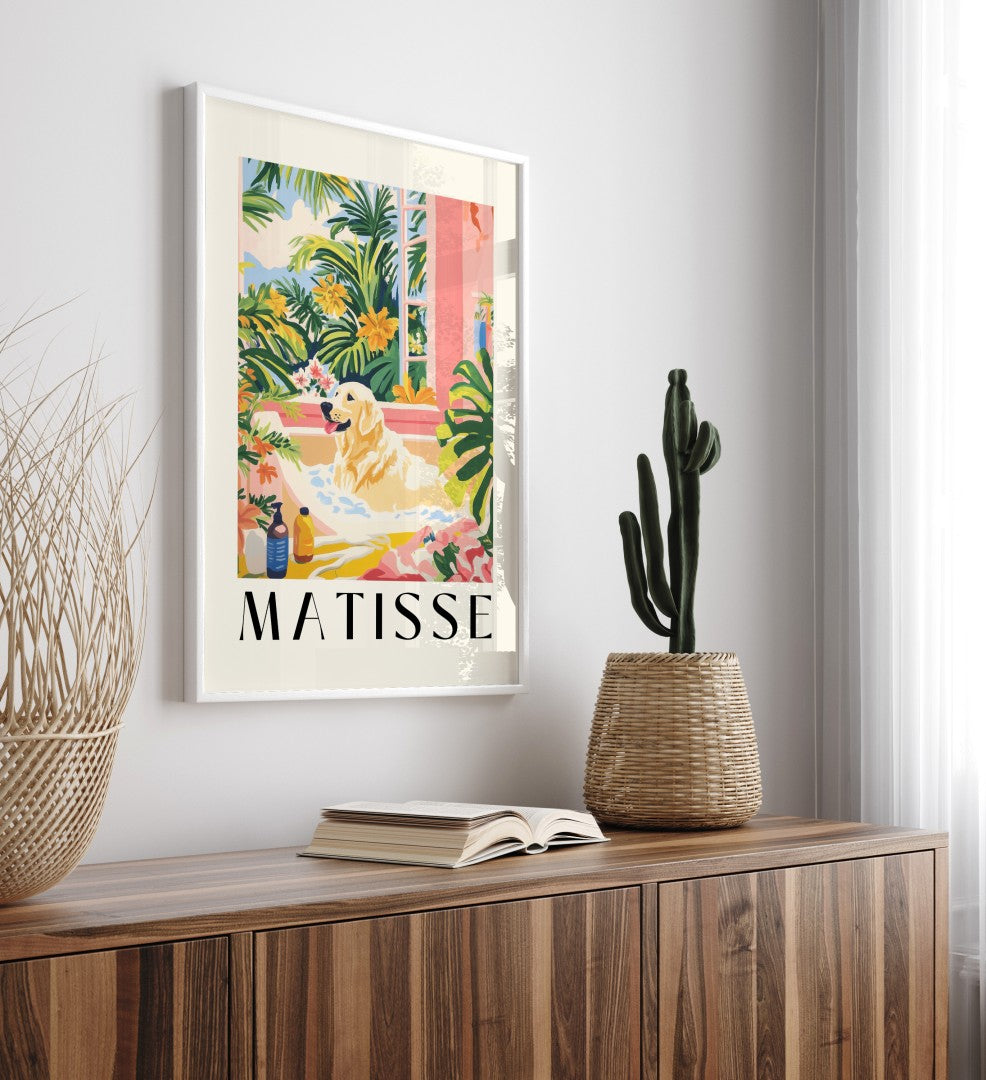 Labrador soaking in a pink bubble bath, framed tropical bathroom artwork.
