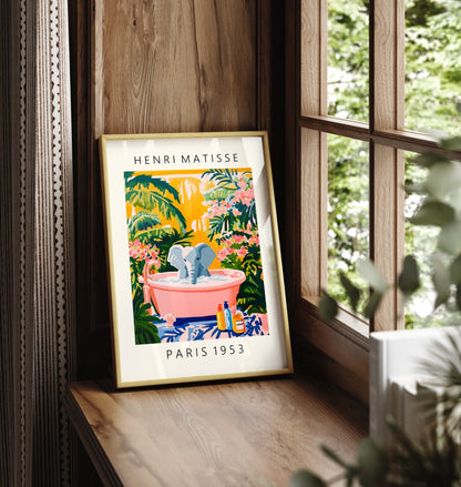 Framed wall art of an elephant relaxing in a bubble bath with floral details.