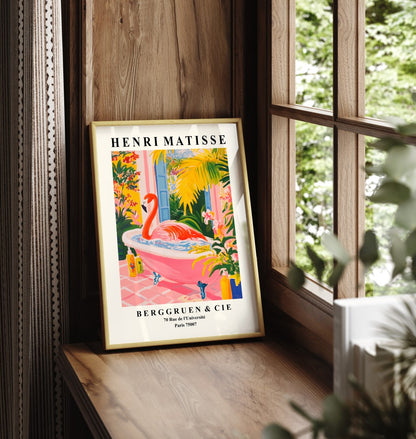 Framed wall art featuring a flamingo soaking in a bathtub, inspired by Matisse.