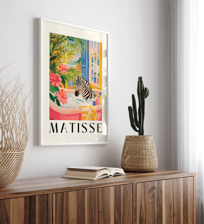 Matisse-style framed bathroom print of a zebra enjoying a bath among greenery.