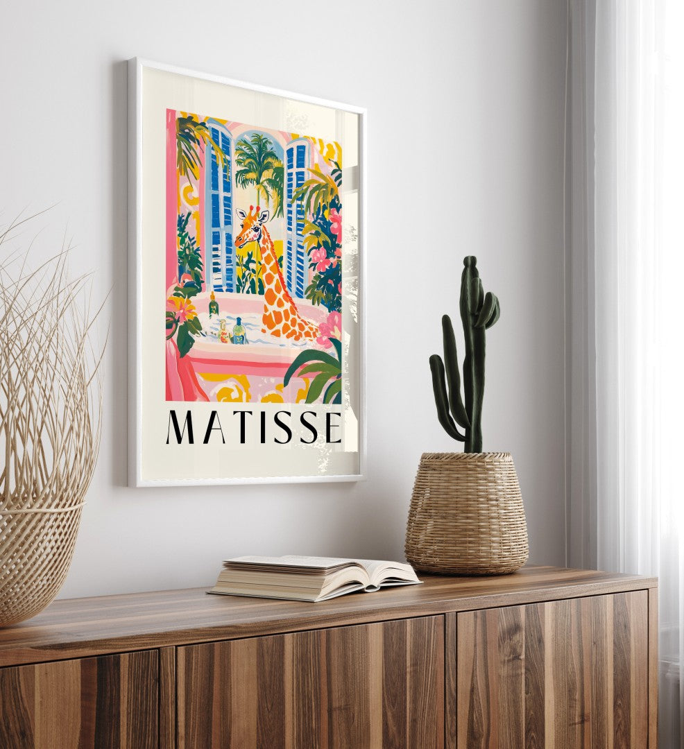 Matisse-inspired framed bathroom print of a giraffe enjoying a soak with greenery.