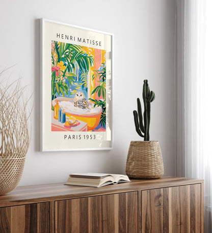 Matisse style framed artwork featuring snowy owl soaking in a golden tub