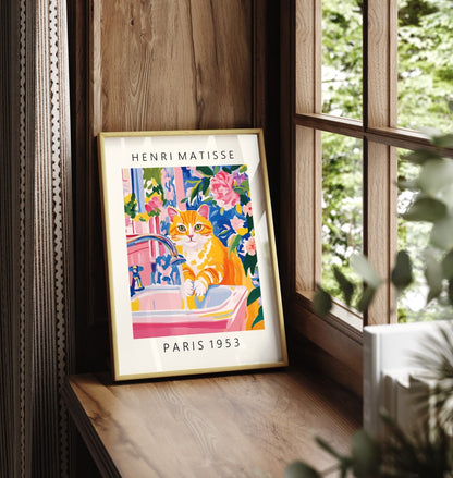 Framed orange cat bathroom art print in colorful Matisse style
