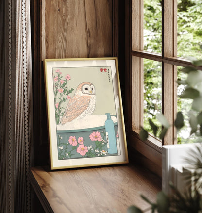 Framed bathroom wall art of a barn owl in a peaceful floral Japanese tub