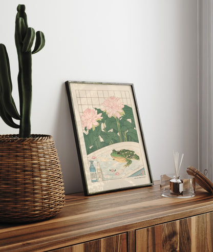 Framed bathroom decor showing a relaxed frog in a flower-filled Japanese bath