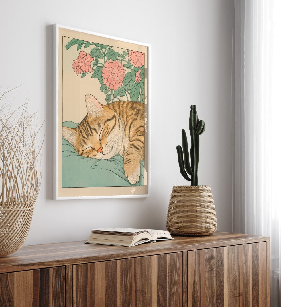 Framed wall art showing a calm tabby napping under floral vines, in a Japanese-inspired style