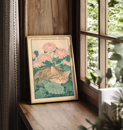 Framed floral cat art showing a tabby napping among blossoms and leaves