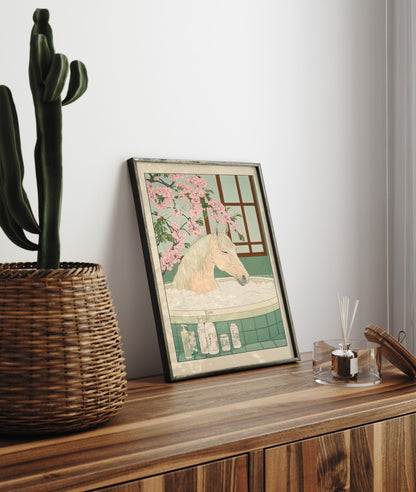 Framed bathroom decor showing a horse resting in a Japanese-style floral bath