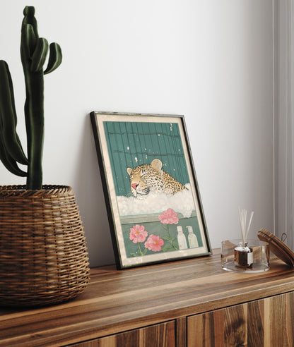 Framed bathroom decor showing a relaxed leopard in a Japanese floral setting