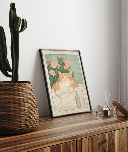 High-quality framed bathroom wall art featuring a relaxed tabby cat in a botanical bath