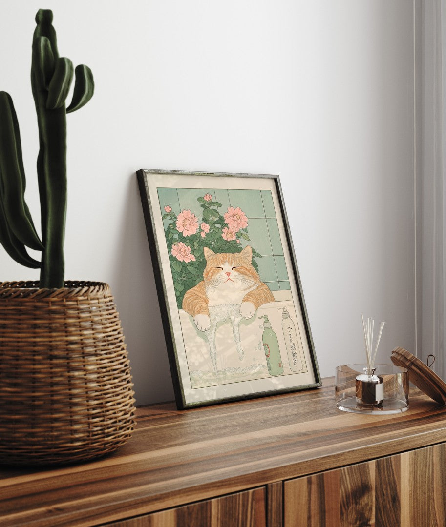 High-quality framed bathroom wall art featuring a relaxed tabby cat in a botanical bath
