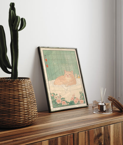 Framed bathroom decor showcasing a peaceful tabby cat in a Japanese-style bath