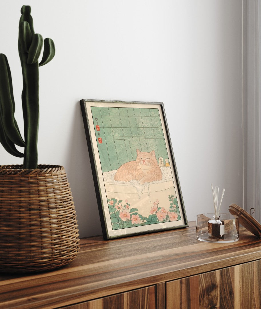 Framed bathroom decor showcasing a peaceful tabby cat in a Japanese-style bath