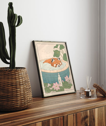 Framed bathroom decor showing a red panda in a calm, floral Japanese-style bath