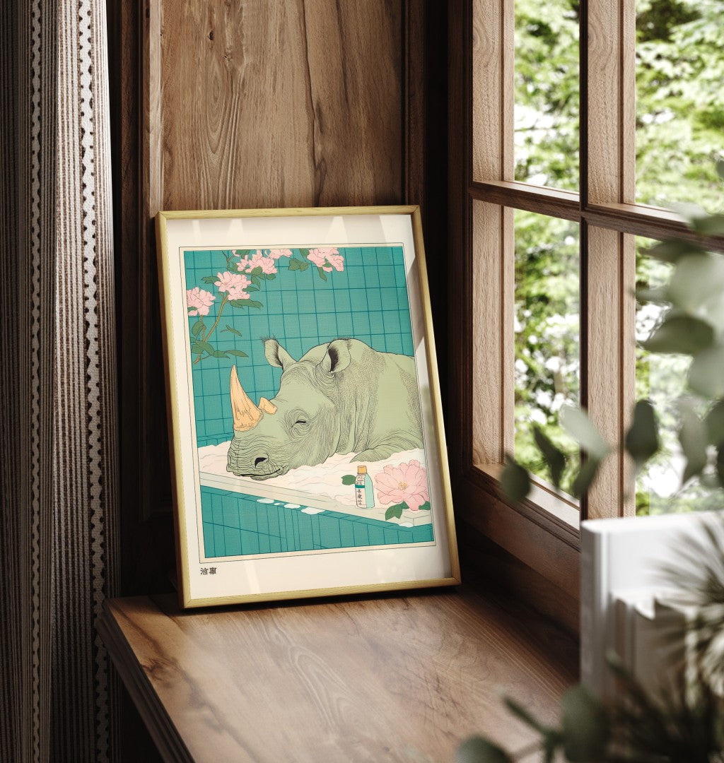 Framed bathroom print of a peaceful rhino in a bubble bath with botanical accents