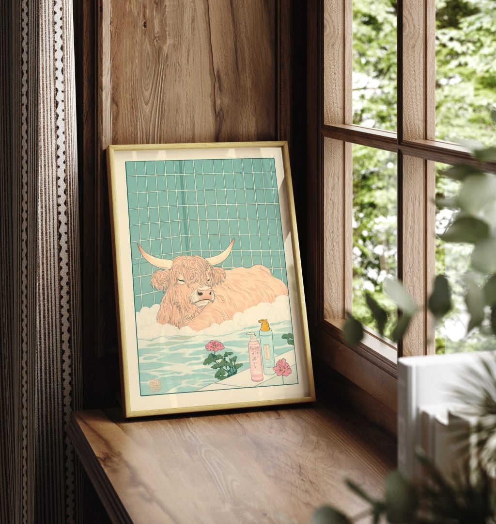 Framed bathroom print featuring a relaxed highland cow in a floral tub setting