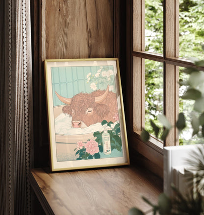 Framed bathroom print of a relaxed highland cow resting in a foamy floral tub