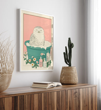 High-quality framed snowy owl bathroom wall art featuring soft florals and greenery