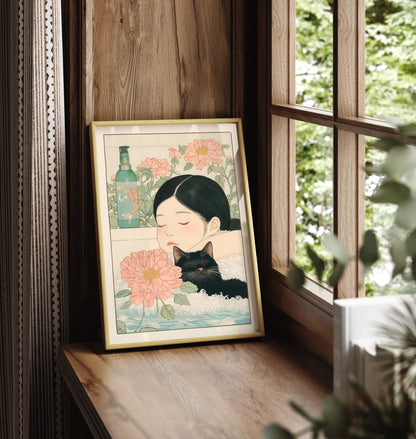 Framed Japanese-style print of girl and cat in bath