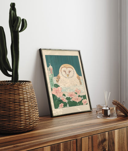 Framed bathroom decor featuring a peaceful barn owl in a flower-filled Japanese bath