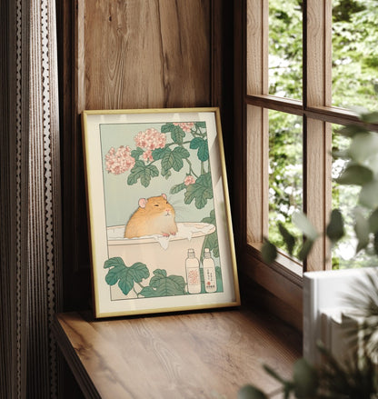 Framed Japanese-style illustration of a hamster enjoying a peaceful soak