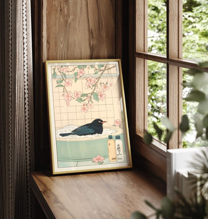 Framed bathroom print of a blackbird soaking in a floral Japanese-style bath